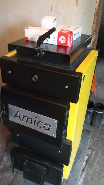 Продам твердопаливный котел  AMIGO