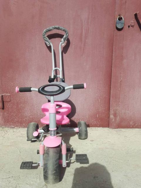 Продається дитячий велосипед-візок з ручкою для дівчинки