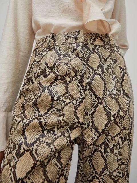 Нові шкіряні жіночі брюки у зміїний принт Primark